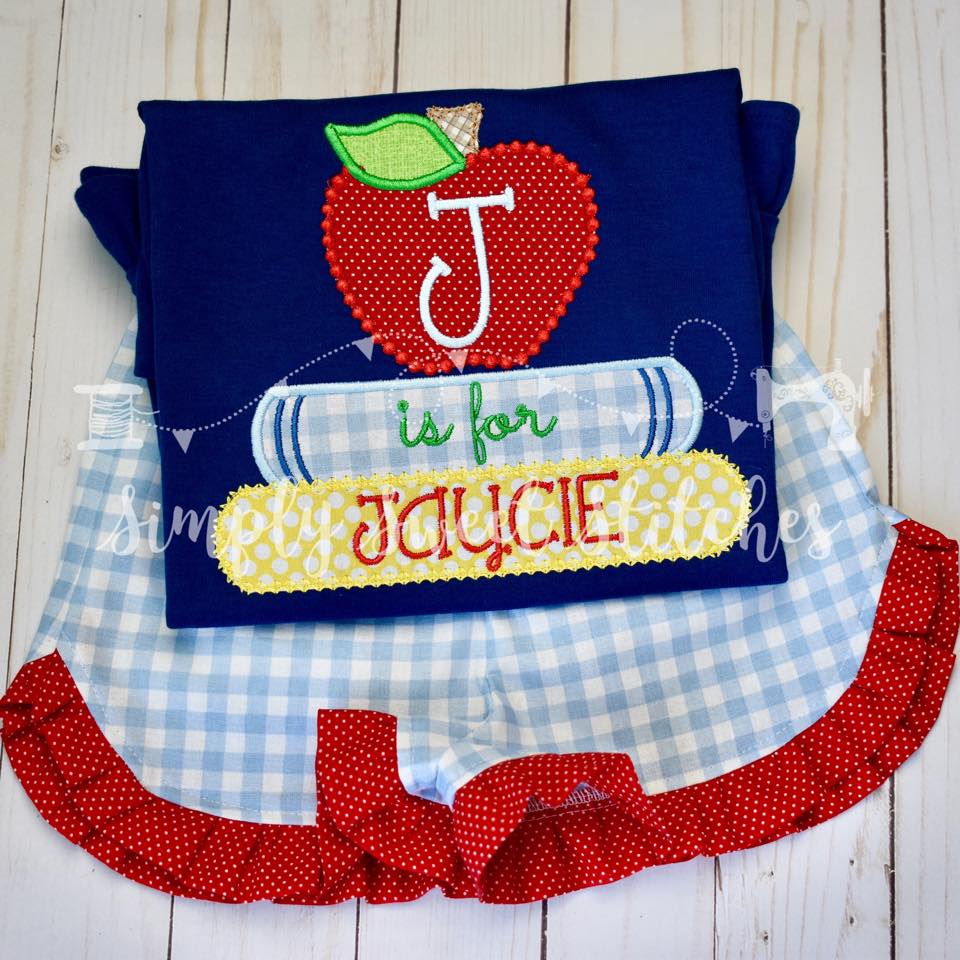 1110 - STACKED BOOKS WITH APPLE - APPLIQUE CHILD SHIRT