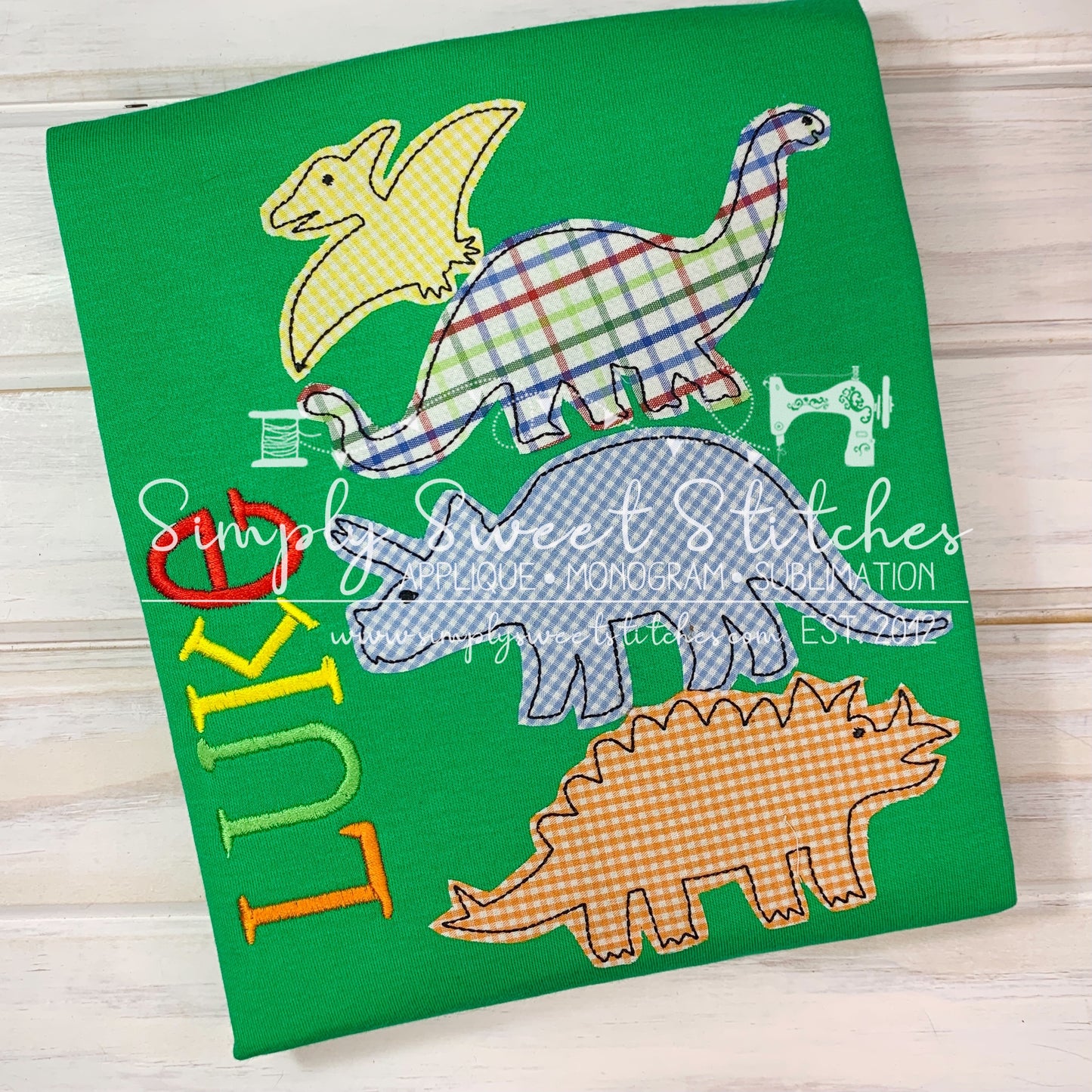 1114 - STACKED DINOSAURS - APPLIQUE CHILD SHIRT