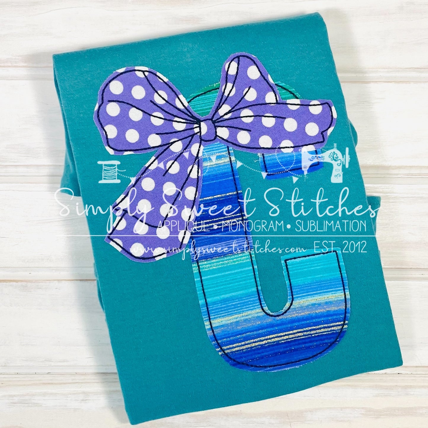 1918 - APPLIQUE LETTER WITH BOW - APPLIQUE CHILD SHIRT