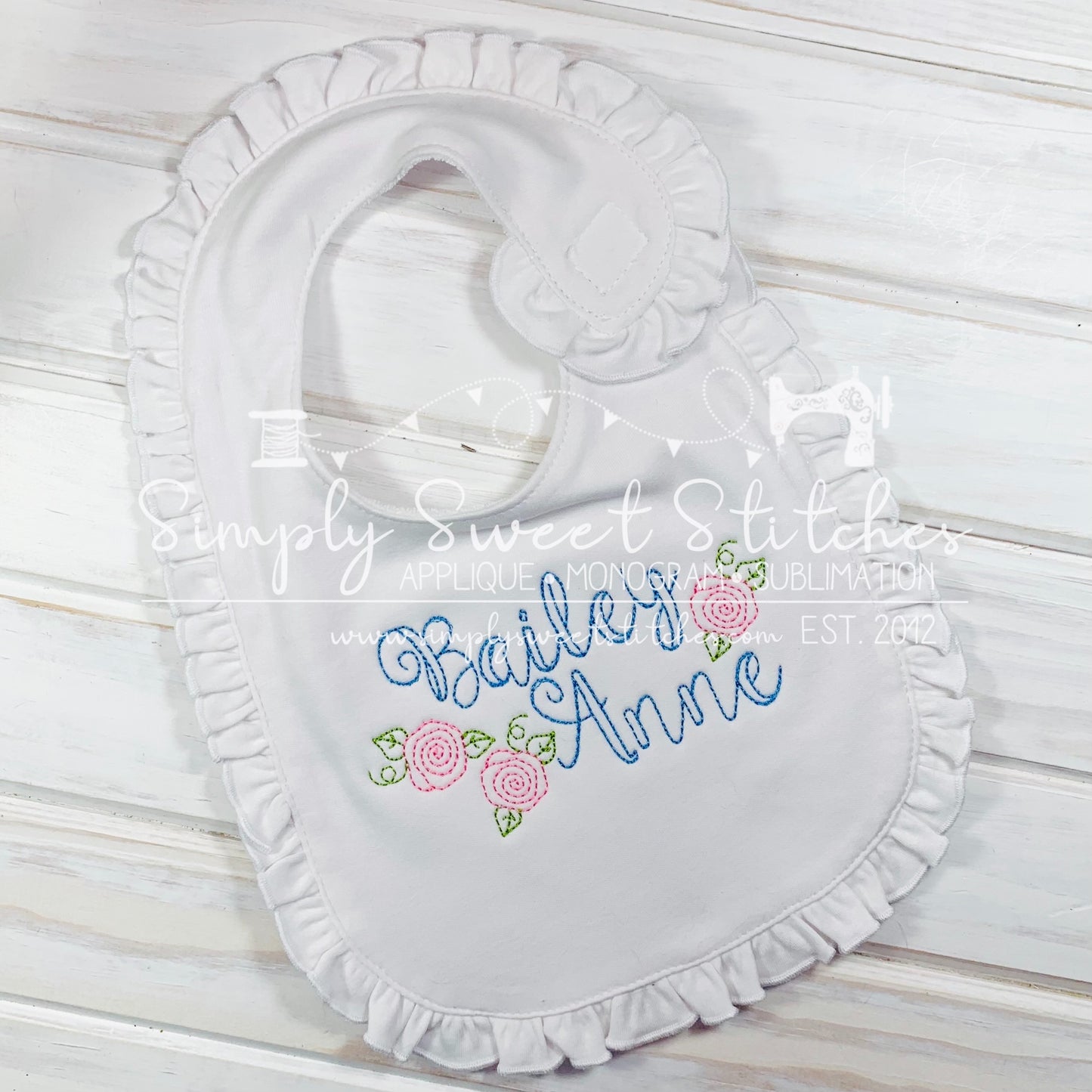 1392 - NAME WITH FLOWERS - EMBROIDERY BIB