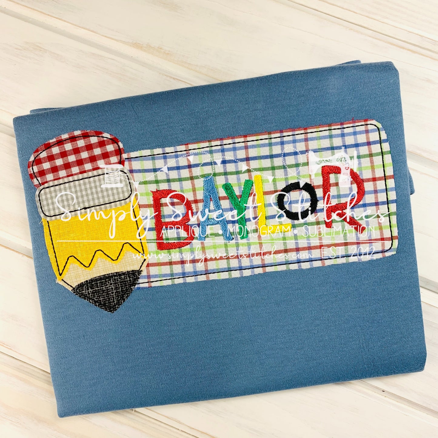 2611 - PENCIL NAME BANNER APPLIQUE - CHILD SHIRT