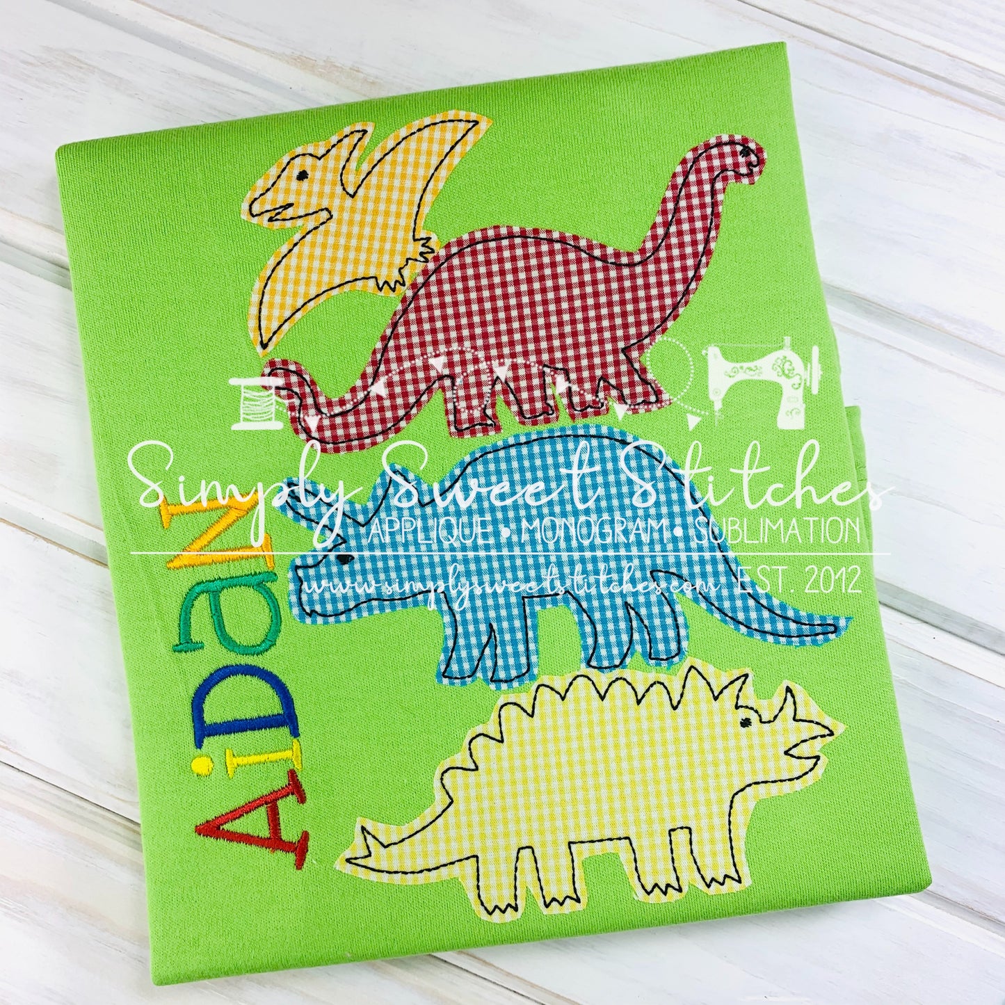 1114 - STACKED DINOSAURS - APPLIQUE CHILD SHIRT