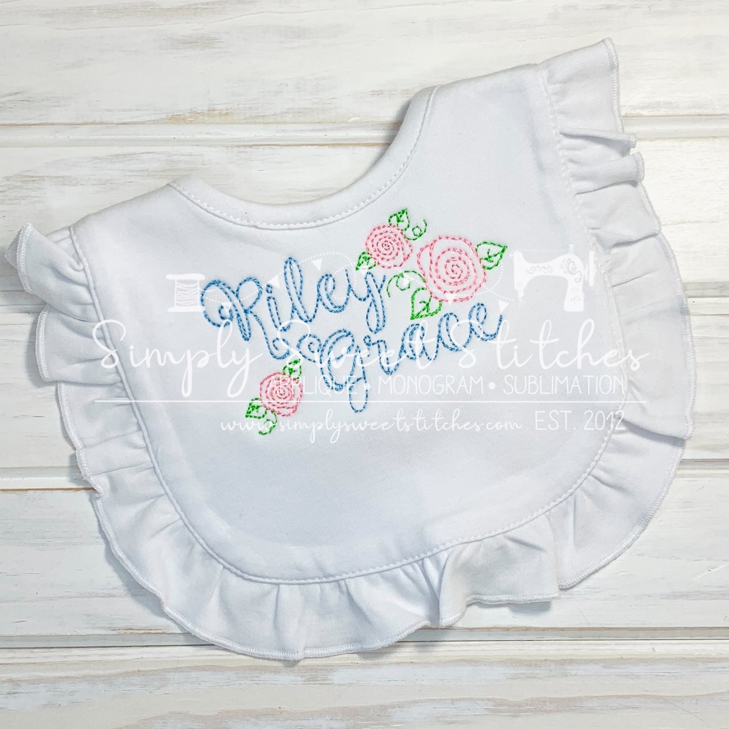 1392 - NAME WITH FLOWERS - EMBROIDERY BIB