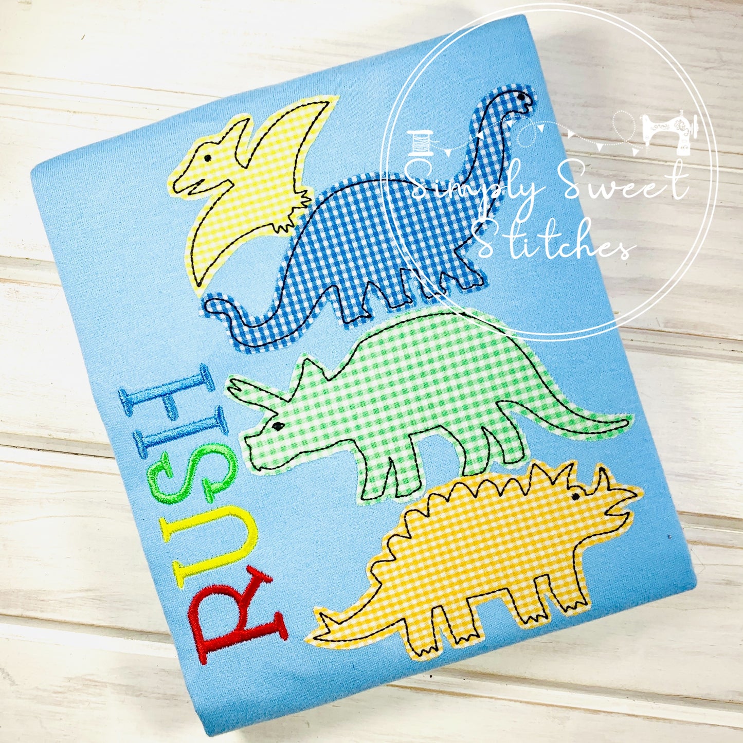 1114 - STACKED DINOSAURS - APPLIQUE CHILD SHIRT