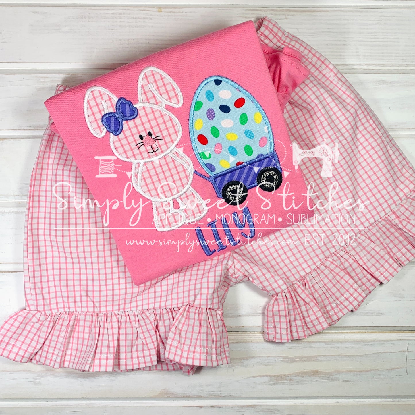 1012 - GIRL EASTER BUNNY WITH EGG IN WAGON - APPLIQUE CHILD SHIRT