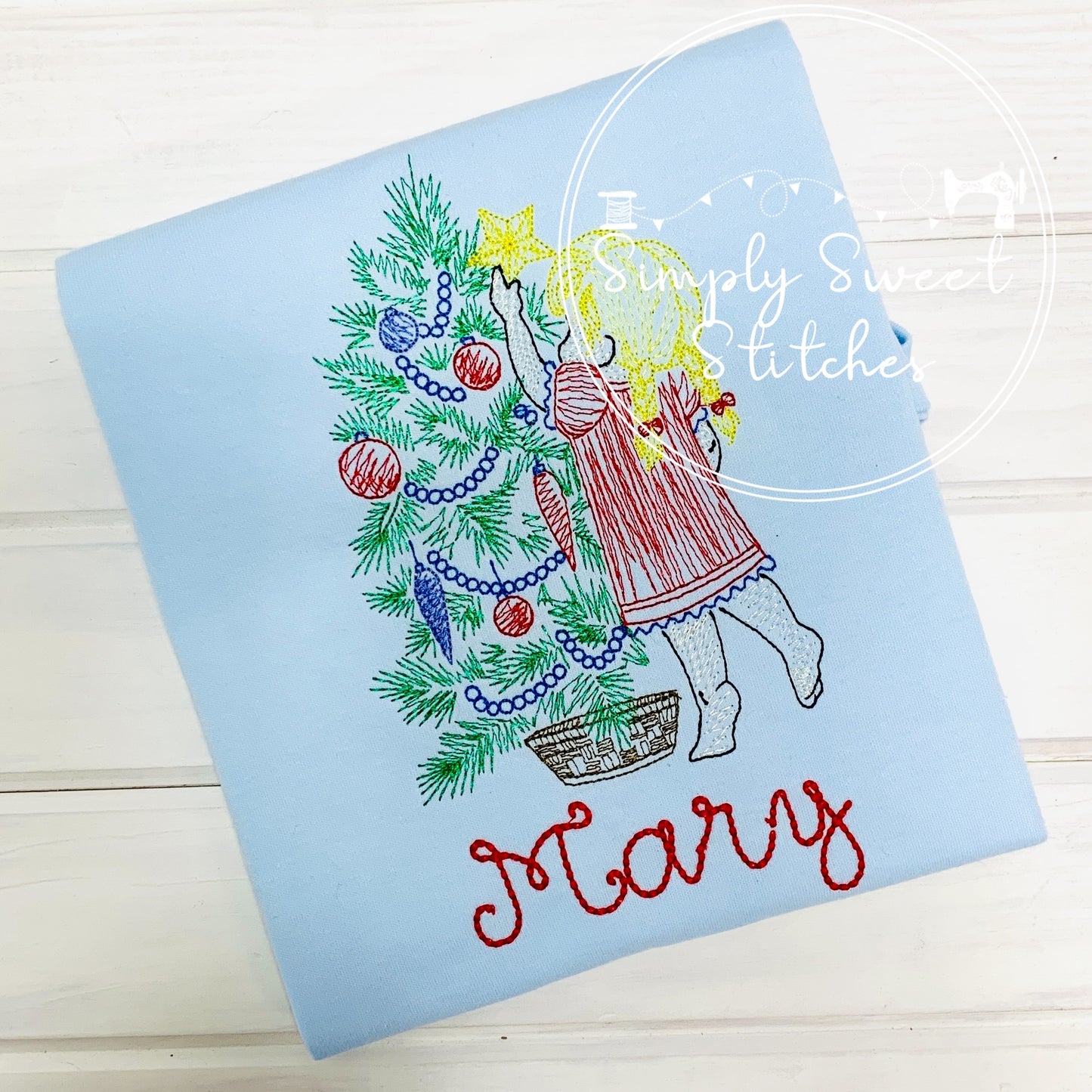 1217 - GIRL PUTTING STAR ON TREE - SKETCH CHILD SHIRT