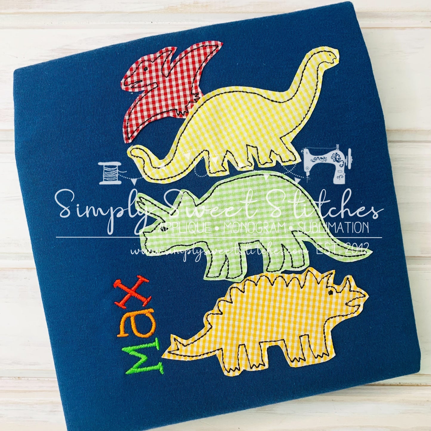 1114 - STACKED DINOSAURS - APPLIQUE CHILD SHIRT