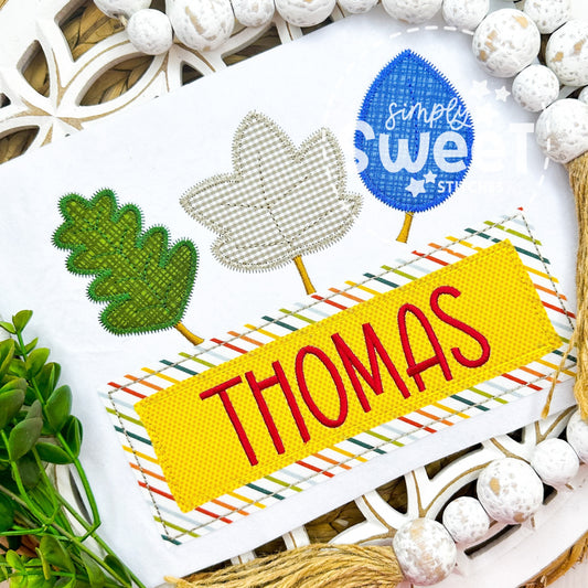 2944 - BOY FALLING LEAVES WITH NAME PLATE - APPLIQUE CHILD SHIRT