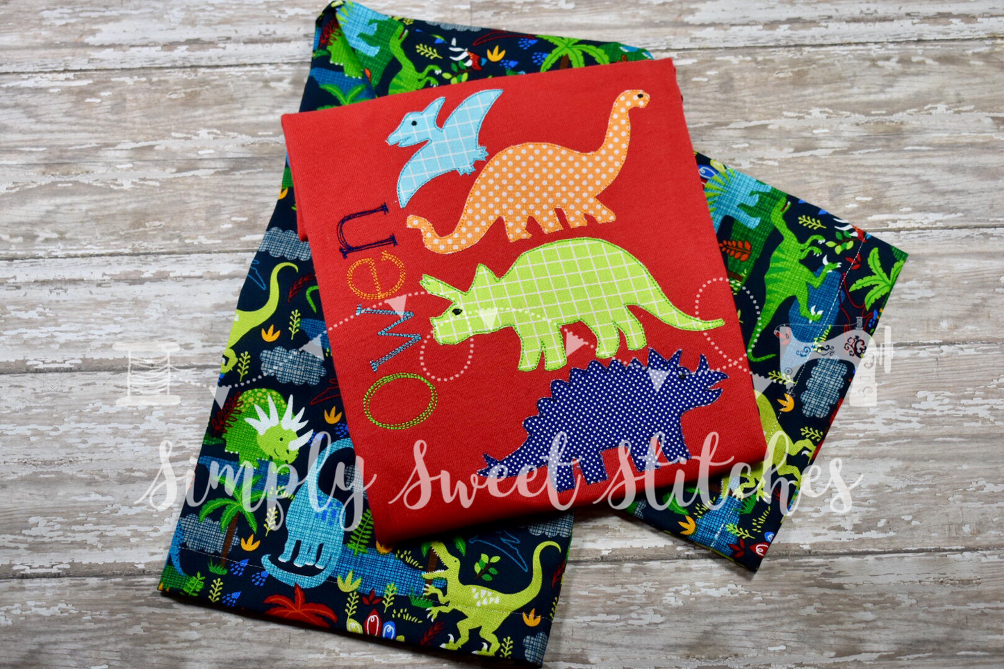 1114 - STACKED DINOSAURS - APPLIQUE CHILD SHIRT