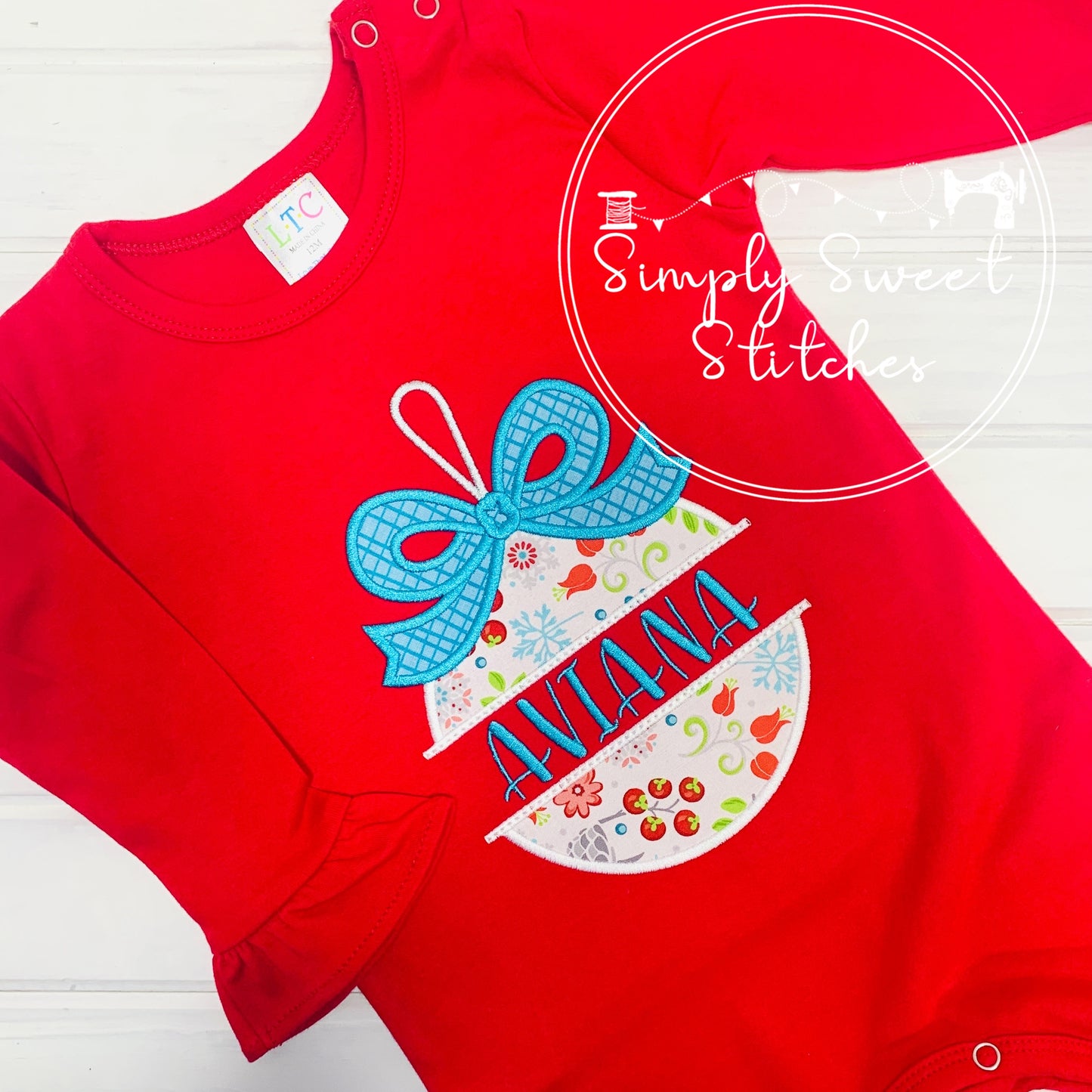 1311 - SPLIT ORNAMENT WITH BOW - APPLIQUE CHILD SHIRT