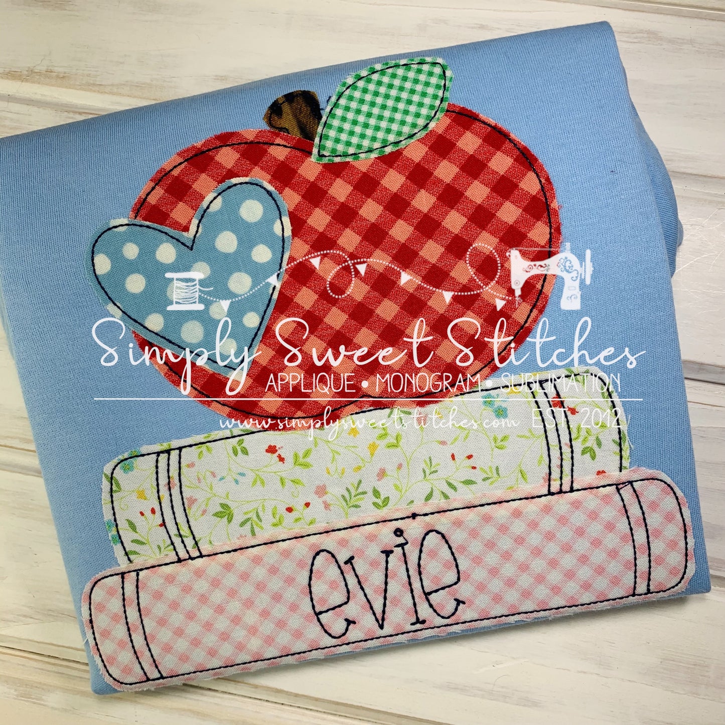 2555 - APPLE WITH HEART STACKED BOOKS - CHILD SHIRT