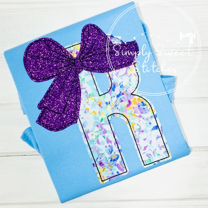 1918 - APPLIQUE LETTER WITH BOW - APPLIQUE CHILD SHIRT